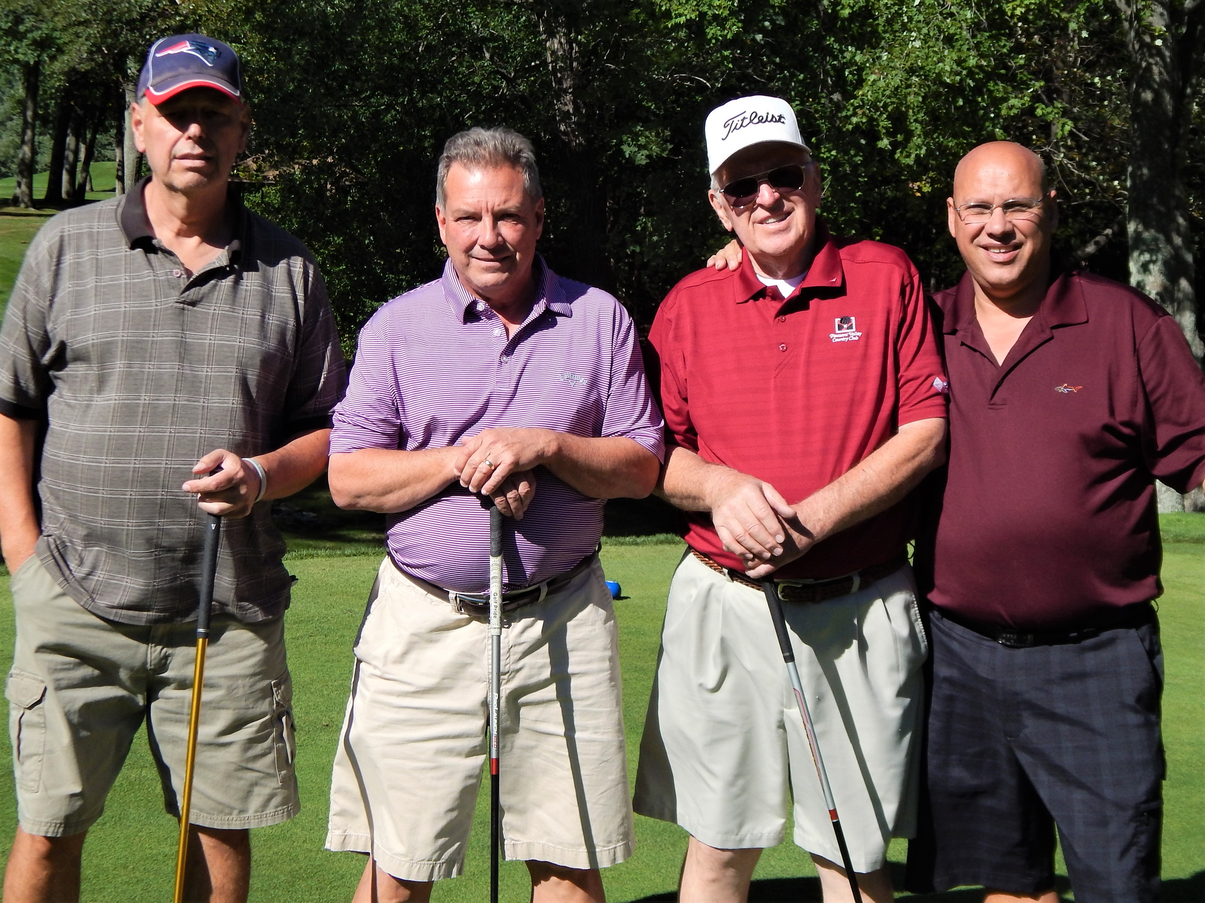 Foursome at 20th Annual Golf Tournament